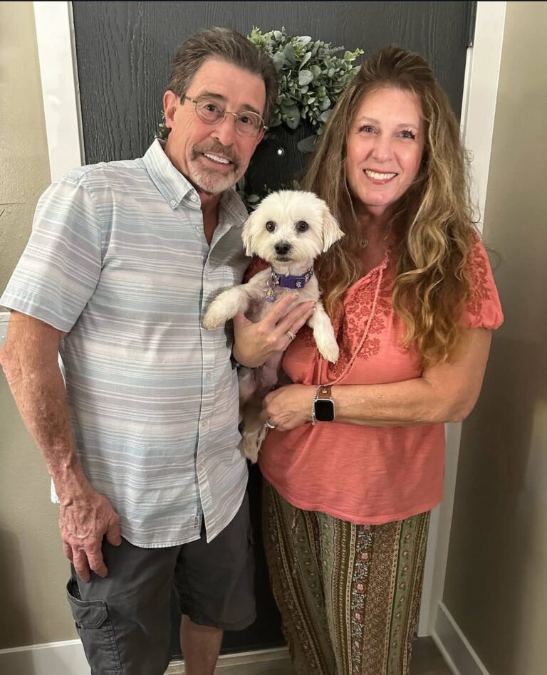 Simone Vaughn at home with their West Highland White Terrier