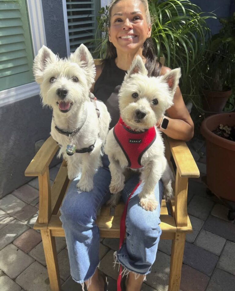 Grace Whitcomb at home with their West Highland White Terrier
